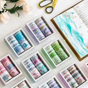 Close-up of assorted washi tape sets in pastel colors for journaling and creative DIY crafts