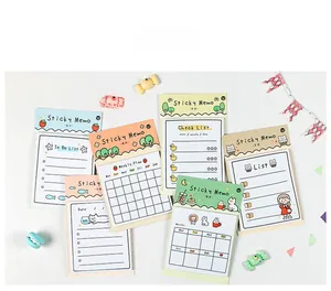 Detailed view of pastel sticky notes featuring weekly plans and cute cartoon animal motifs