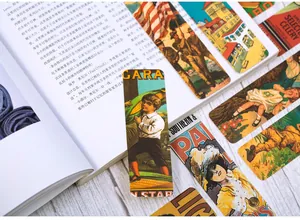 Artistic vintage paper bookmarks with nostalgic illustrations on light wooden background