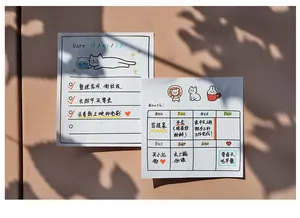 Detailed view of hand-drawn animal memo pads with weekly planner and to-do list layout