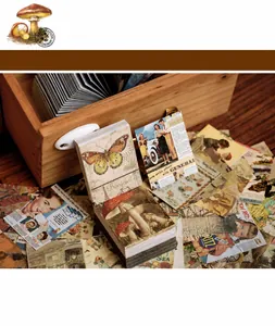 Close-up of 400 sheets vintage scrapbook paper with retro butterfly and mushroom patterns