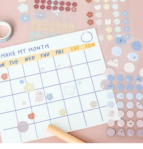Detail of Monthly Planner and cute cartoon stickers for DIY scrapbooking decoration