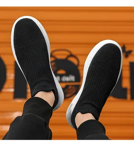 Detailed view of breathable black knit mesh upper on lightweight men sneakers