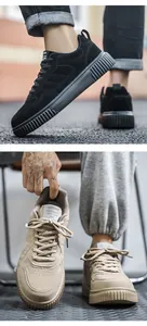 Detailed view of non-slip thick soles and suede texture on khaki casual skate shoes