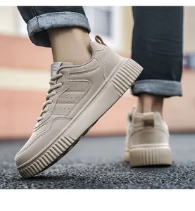 Detail showing flexible thick rubber sole and premium beige suede upper during movement