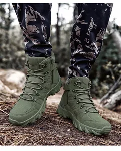 Detail of army green tactical boots featuring side zipper and high-grip outsole