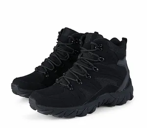 Detailed shot of breathable mesh and matte leather on professional black tactical boots