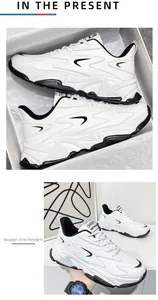 Detailed view of white fashion sneakers with thick soles and stylish black contrast accents