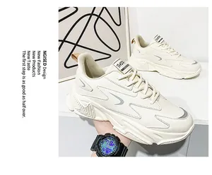 Close-up of cream casual dad sneakers with mesh texture and thick anti-slip sole