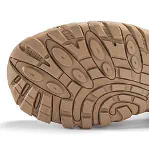 Macro shot of durable rubber outsole with anti-slip patterns for outdoor combat boots