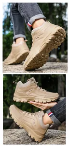 Detail of khaki outdoor hiking boots showing high-grip rubber sole and leather mesh upper