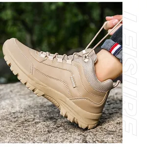 Outdoor khaki hiking boot detail featuring deep-tread anti-slip sole and fashion label