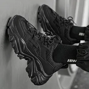 Men's stylish all-black chunky dad sneakers with breathable mesh and thick platform soles