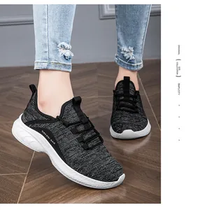 Macro detail of breathable knitted mesh texture and logo on these casual running shoes