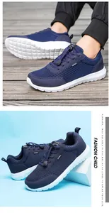 Detail of navy breathable mesh sneaker with elastic toggle laces and white thick sole
