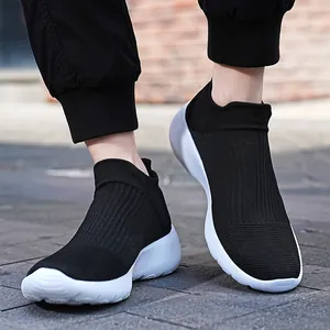 Unisex black knit sock sneakers with breathable elastic mesh and white foam soles