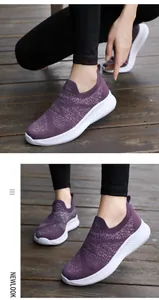 Macro shot of purple knitted mesh walking shoes for women featuring breathable fabric