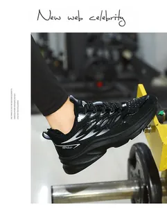 Macro view of breathable black mesh surface and stylish synthetic overlays on sports shoes