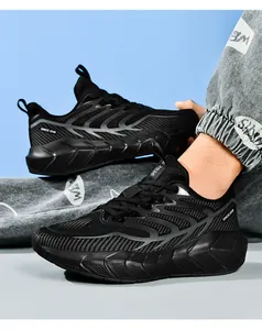 Close-up of black breathable mesh running shoe with grey flame patterns and soft EVA sole