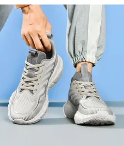 Detail of gray running shoes with breathable mesh and thick anti-slip sole for jogging
