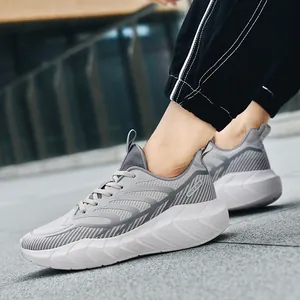 Men's breathable mesh running sneakers with thick cushioning sole in grey and silver
