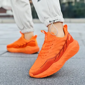 Vibrant orange breathable running shoes with cushioning thick soles for outdoors