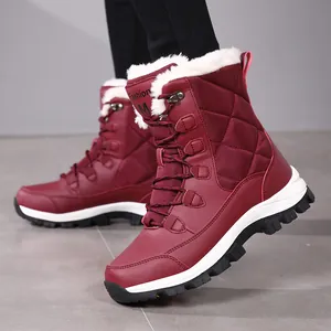 Women's burgundy high-top snow boots with warm faux fur lining and quilted design