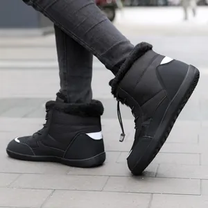 Black waterproof winter snow boots with warm faux fur lining and non-slip rubber soles