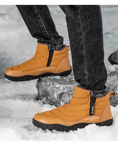 Close-up of waterproof ginger snow boot with side zipper and thick faux fur lining