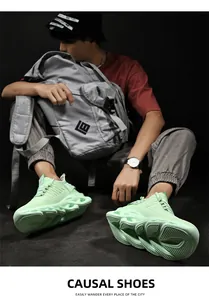 Detail of mint green men's casual sneakers with breathable mesh and geometric midsole