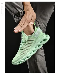 Detail of mint green running shoe featuring breathable mesh and hollow wave sole