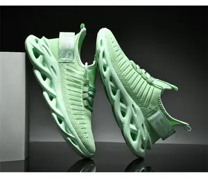 Detailed macro view of mint green knit running shoes with hollow blade cushioning soles