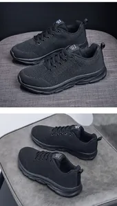 Detail view of black breathable mesh upper and durable rubber sole on casual sneakers