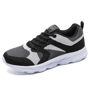 Leichte atmungsaktive Mesh-Sneaker für Damen im schwarz-grau-weißen Trikolore-Design
