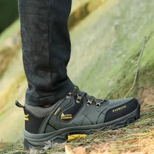 Men's outdoor hiking shoes in army green durable synthetic leather on natural grass