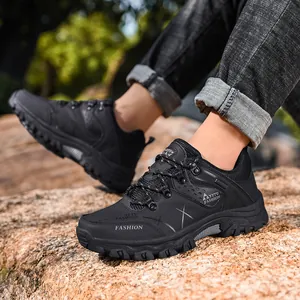 Men's outdoor hiking shoes in black featuring non-slip rubber soles and mesh upper design