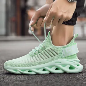 Men's mint green breathable mesh running sneakers with unique wavy hollow thick soles