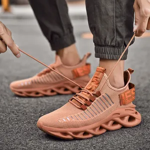 Men's breathable mesh running shoes in orange with hollow shock-absorbing wave soles