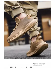 Detail showing breathable mesh texture and SIKTEQ heel pull tab on khaki running shoes