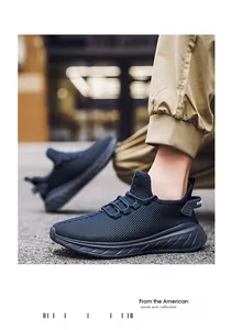 Detail of navy blue running shoe with breathable mesh fabric and thick anti-slip sole
