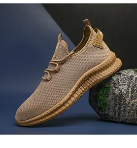 Detailed close-up of khaki breathable mesh running shoe with thick textured sole