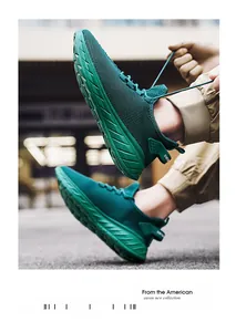Detail of dark green breathable mesh running shoe with thick non-slip sole in outdoor setting