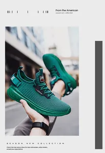Close-up of emerald green breathable knit fabric and traction sole on men running shoes