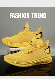 Detailed macro view of yellow breathable knit mesh upper and thick foam sole on sneakers