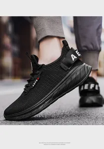 Close-up of black breathable mesh sneaker with AEFE branding and cushioned EVA foam sole