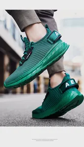 Macro shot of breathable dark green mesh running shoe with black AEFE logo strap detailing