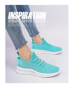 Close-up of mint green breathable mesh sneakers with white thick anti-slip soles