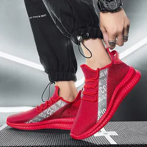 Men's breathable mesh running shoes in vibrant red with stylish side letter detailing