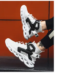 Dynamic on-foot shot of white mesh running shoes with hollow sole and black accents
