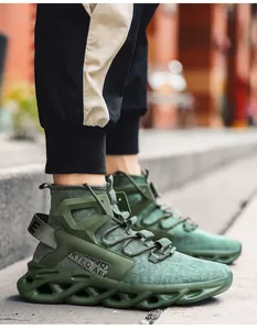 Side view of men's military green high-top sneaker with futuristic hollow geometric sole